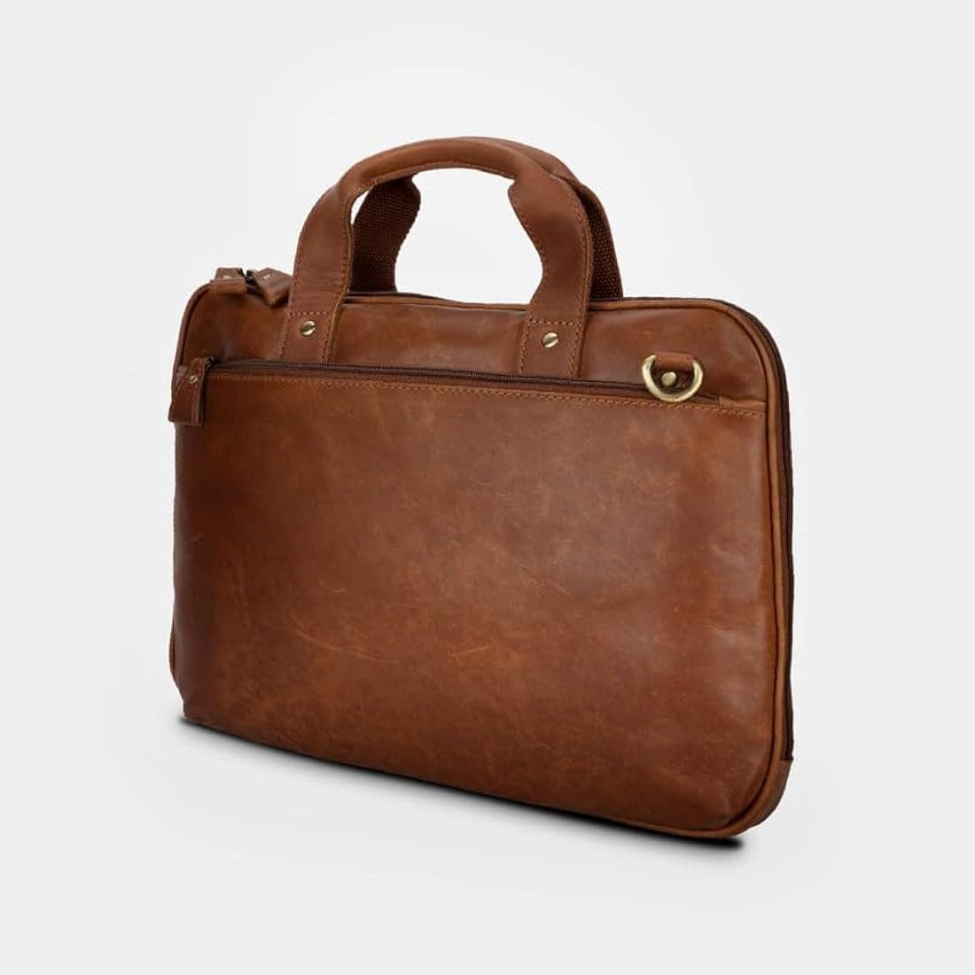 Slim tan leather laptop bag with a zipped front pocket and short handles