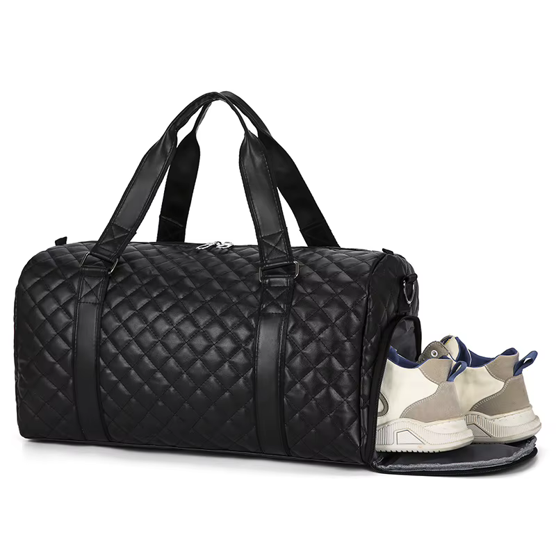 Black quilted leather duffel bag with a separate shoe compartment