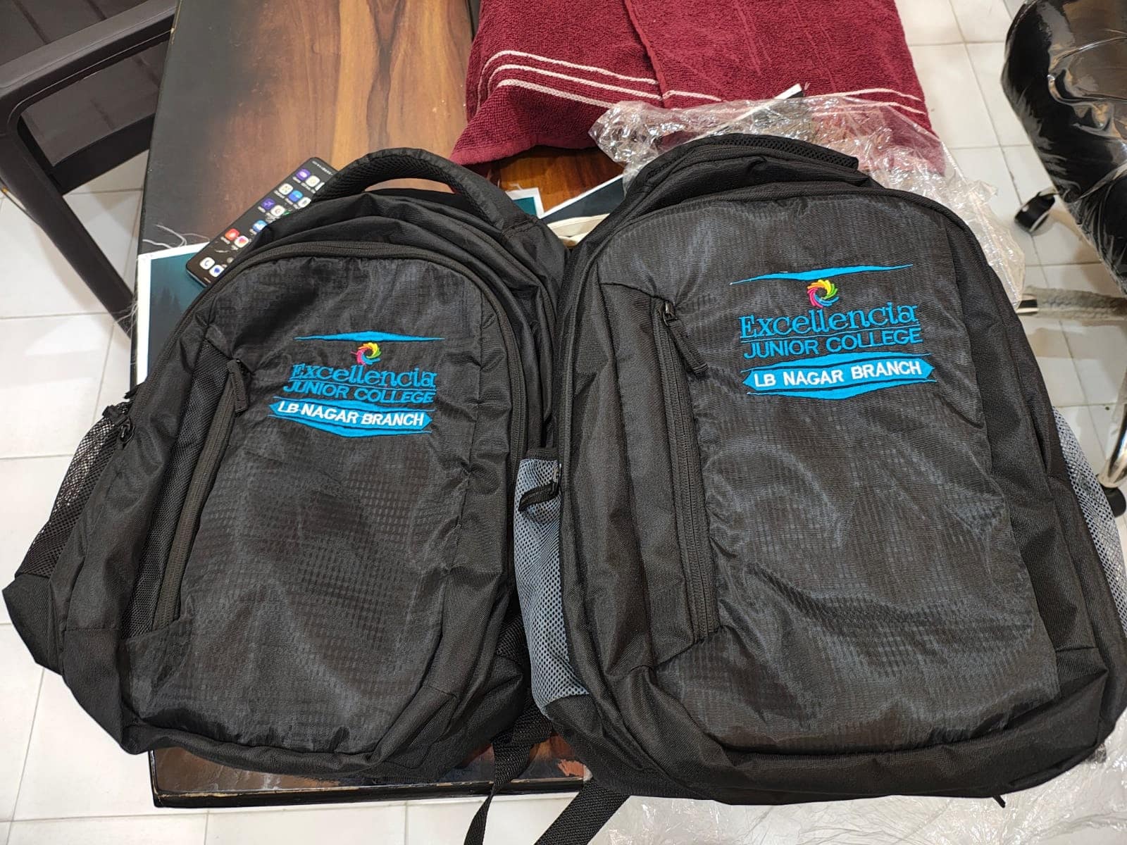Junior college backpacks embroidered with a customer's logo and branch name